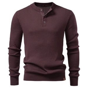 Detailed view of burgundy men's knit Henley shirt with vertical ribbed texture and long sleeves