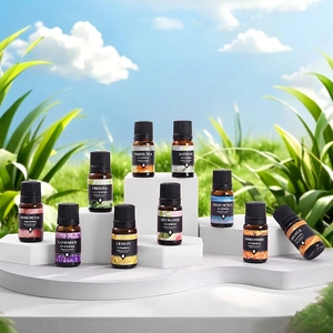 Essential oil set with 10 fragrances displayed on white steps under a blue sky