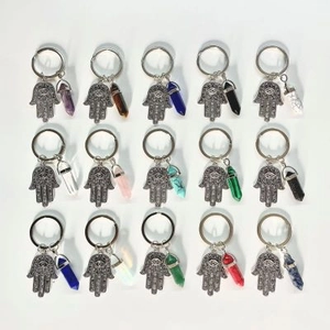 Detailed set of 15 Hamsa Hand keychains with hexagonal natural stone pillars in assorted colors
