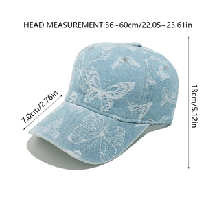 Detail view of denim baseball cap with butterfly embroidery and size specifications