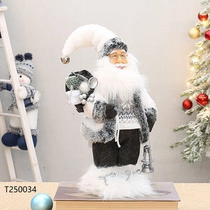 Detailed view of a Nordic Santa doll with plush textures and a miniature lantern