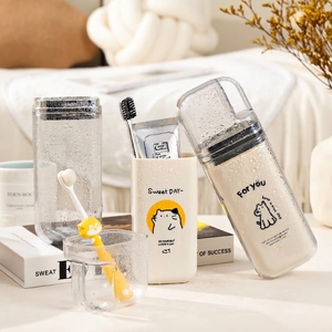 Portable travel toothbrush storage cup set with cute illustrations and sleek PET finish