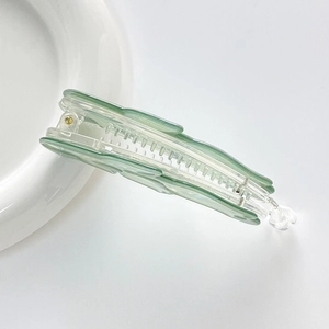 Iridescent light green acrylic rose flower hair clip with elegant banana clip design
