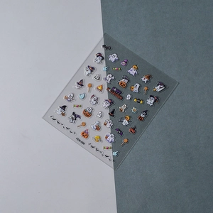 Detail of 5D Halloween nail art stickers with embossed ghost, pumpkin and candy designs