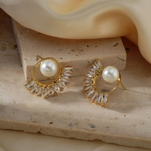 Elegant gold pearl stud earrings with rectangular zircon fans on stone and silk
