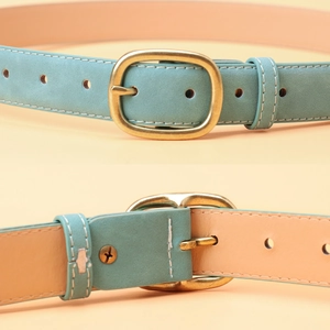 Teal suede leather belt with white stitching and brass oval buckle for casual jeans