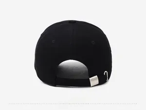 Detail view of the black baseball cap rear with adjustable metal buckle and strap