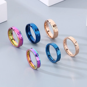 Textured hammered stainless steel rings in multi-color finishes for couples