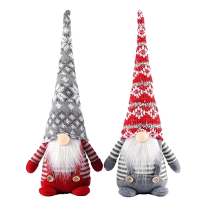 Christmas faceless gnome figurines in red and grey with knitted snowflake hats for decor