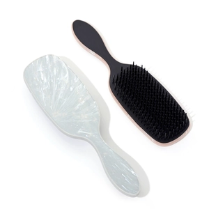 Hair brush set with marble pattern handle and black bristles for scalp massage