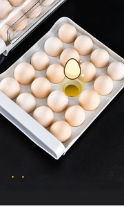 Detail view of the 20-grid egg storage box showing the anti-slip conical groove design