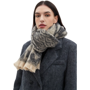 Gray leopard print scarf with beige tassels on model, soft winter jacquard shawl wrap