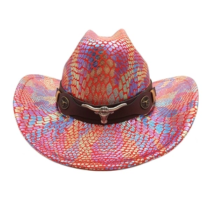 Macro detail of iridescent snake scale texture and silver bull head on wool cowboy hat