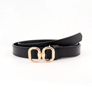 Chic black PU leather skinny belt for women with interlocking gold metal buckle on white