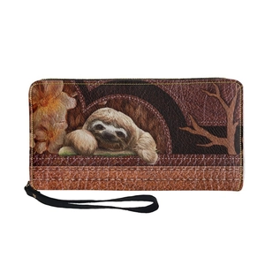 Long brown PU leather zipper wallet with sloth and floral prints and a black hand strap