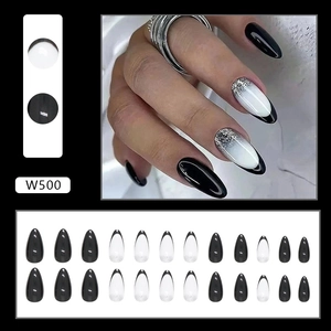 Detail of medium almond press-on nails with black French tips and silver glitter gradient