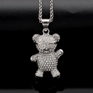 Iced-out teddy bear pendant necklace with glasses in silver-toned stainless steel