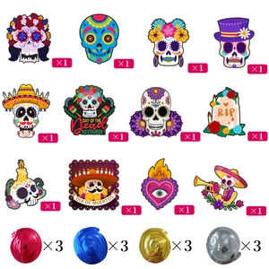Day of the Dead decoration set with 24 colorful skull cutouts and metallic foil spirals