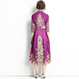 Elegant purple V-neck dress with ethnic print and matching belt shown from the back