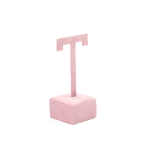 Pink velvet T-bar jewelry stand for earrings with a stable square base on a white background