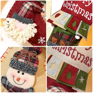 Detailed views of Christmas stockings with Santa and snowman 3D plush applique designs