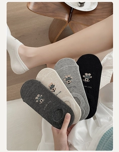 Close-up of low-cut cotton socks with cute bear embroidery and OFFWEGO branding