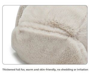 Close-up of thick faux fur ear flaps on a winter trapper hat with premium soft texture