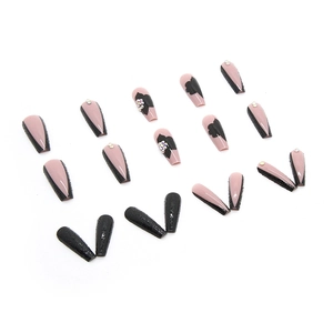 Long ballerina press-on nails in black and pink with rhinestone floral accents
