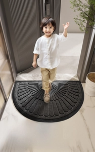 Macro detail of semi-circle entrance mat with durable anti-slip rubber texture