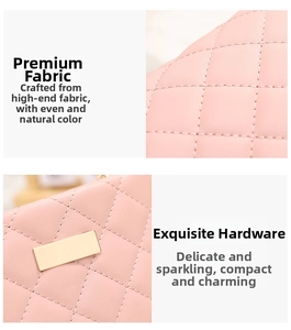 Detail of pink quilted leather shoulder bag with elegant light gold metal hardware