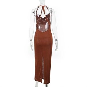 Detail of brown backless dress featuring cross straps and a slit on the back
