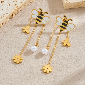 Elegant gold bee tassel earrings with enamel details, small flowers and pearls