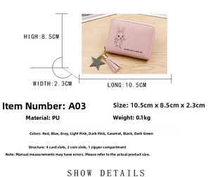 Detail showing pink PU leather short wallet with cute rabbit print and star tassel charm