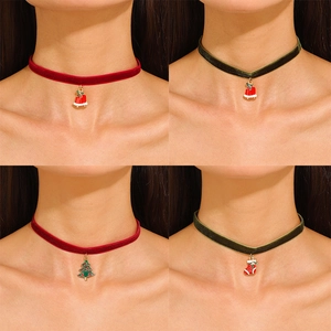 Velvet Christmas chokers with festive bell and tree charms shown on models in a 2x2 grid view