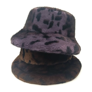 Plush leopard print faux fur bucket hats for women in purple and brown tones
