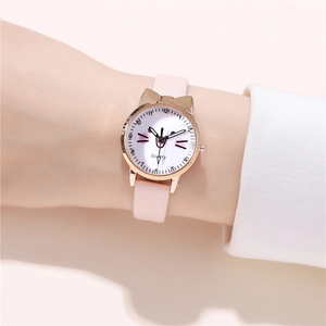 Detailed shot of the pink leather strap watch with rose gold cat ear case and kitten dial