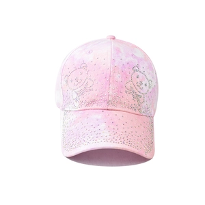 Detailed view of pink tie-dye baseball cap featuring rhinestone bears and glitter accents