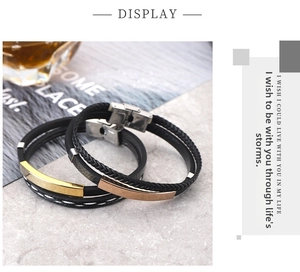 Detailed close-up of woven leather couple bracelets with gold and rose gold metal bars