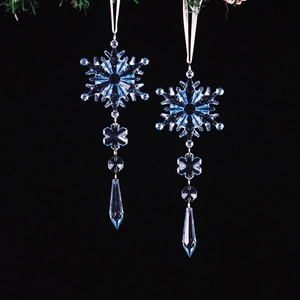 Detail of blue crystal snowflake ornaments with teardrop pendants for Christmas tree