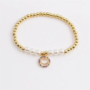 Gold-plated beaded bracelet with pearls and a colorful zircon smile face pendant
