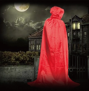 Red hooded satin cloak for Halloween costumes shown in a spooky night scene