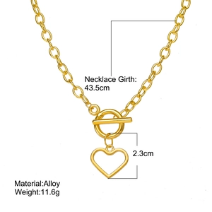 Detail shot of golden alloy OT buckle necklace with heart pendant and dimensions