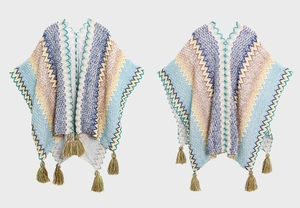 Detail of bohemian knit shawl with colorful wave stripes and fringe tassels decoration