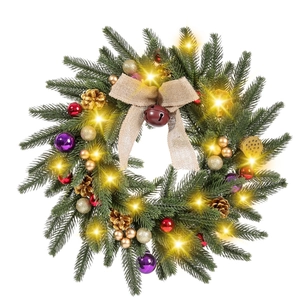 Christmas wreath with LED lights, pine cones, and red ornaments on a white background