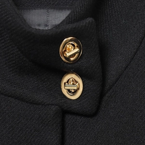 French style houndstooth wool jacket with gold twist-lock and herringbone texture