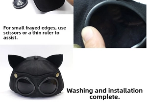 Detail showing the installation of black cat-ear aviator cap with goggles and buttons