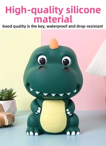 Detail of green dinosaur piggy bank made of durable waterproof vinyl material