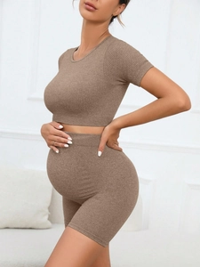 Detailed side view of ribbed knit maternity yoga set with seamless high waist shorts