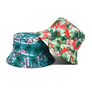 Outdoor tropical flamingo and palm leaf print bucket hats for beach sun protection