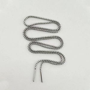 Macro shot of silver stainless steel box chain with smooth metallic end caps